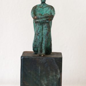 Figura humana 1. Bronce y madera. 23X8x8cm